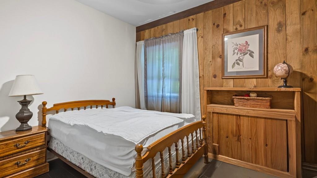 610 Madola Road, Unit 1 Epworth, GA 30541 - Photo 11 of 14 a bedroom with a bed and a window