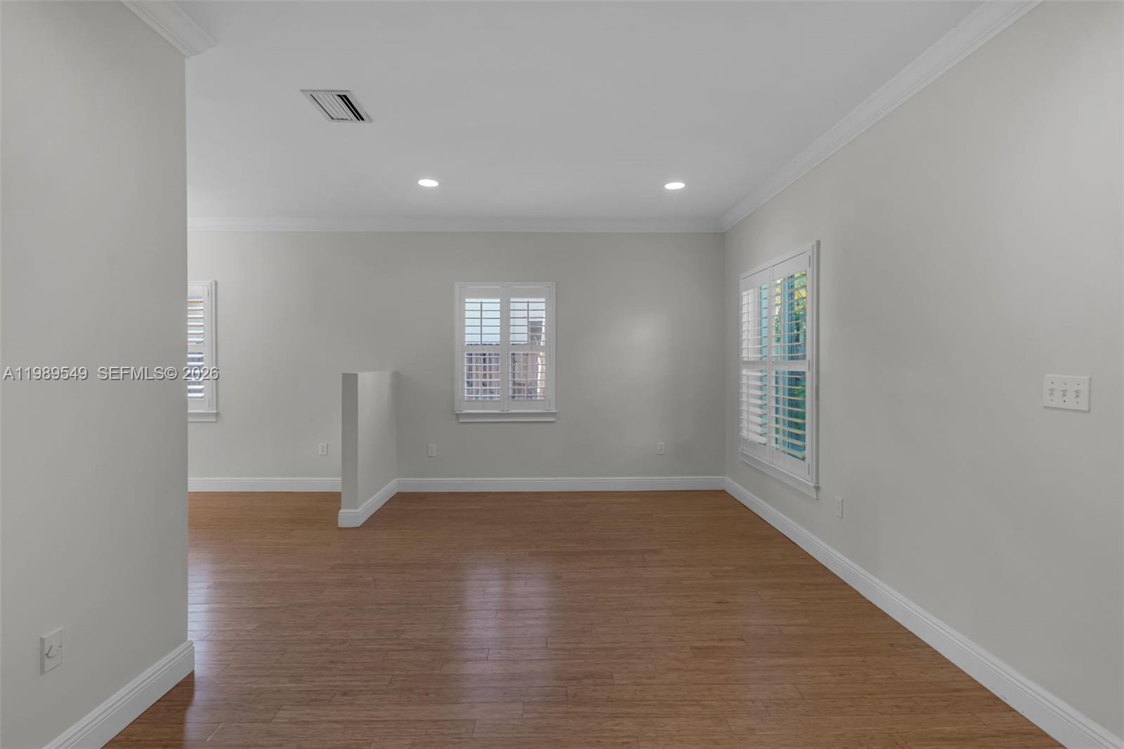 7048 Southwest 83rd Court Miami, FL 33143 - Photo 16 of 38 a view of an empty room and a window