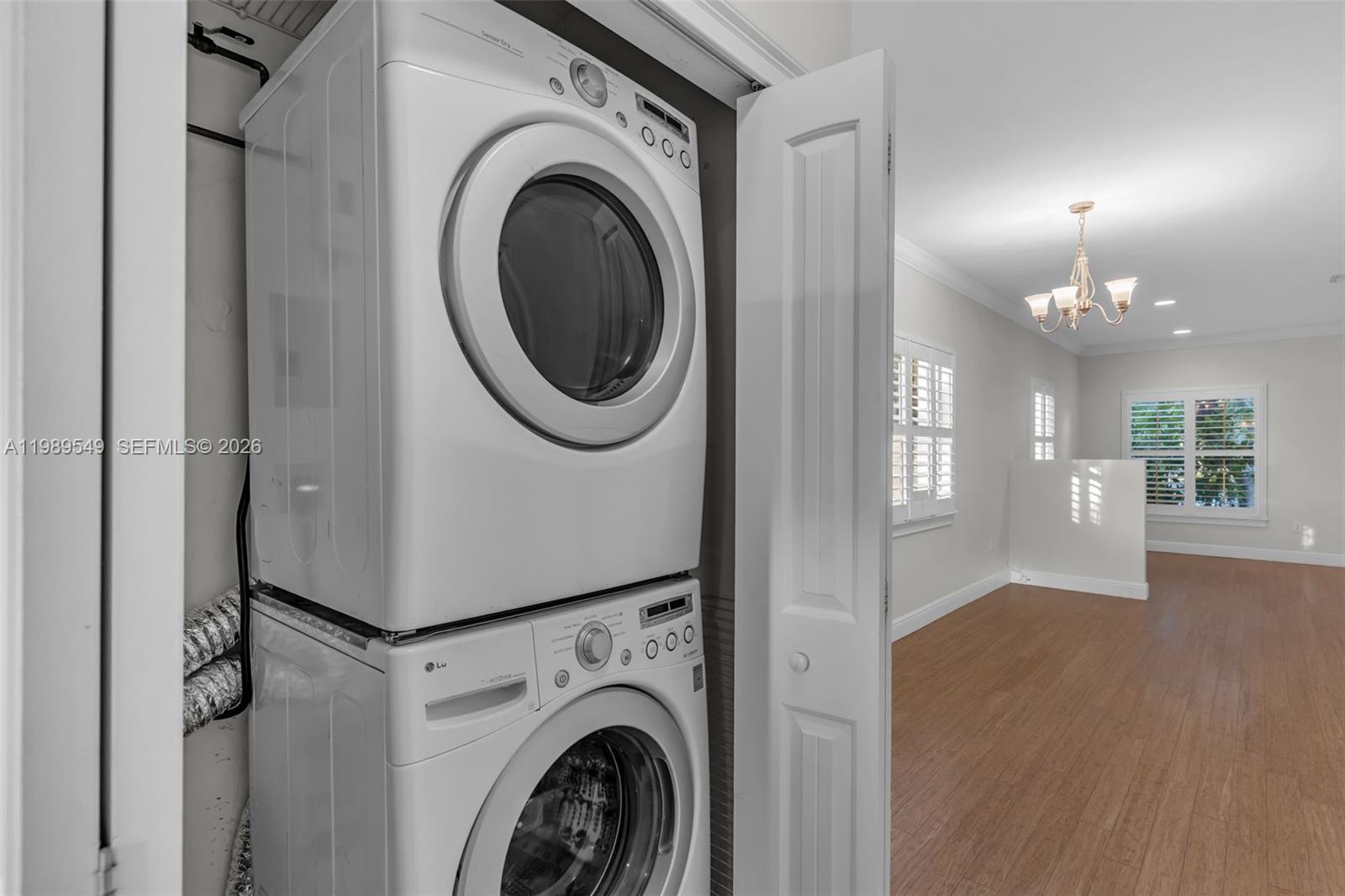 7048 Southwest 83rd Court Miami, FL 33143 - Photo 24 of 38 a view of a hallway with washer and dryer