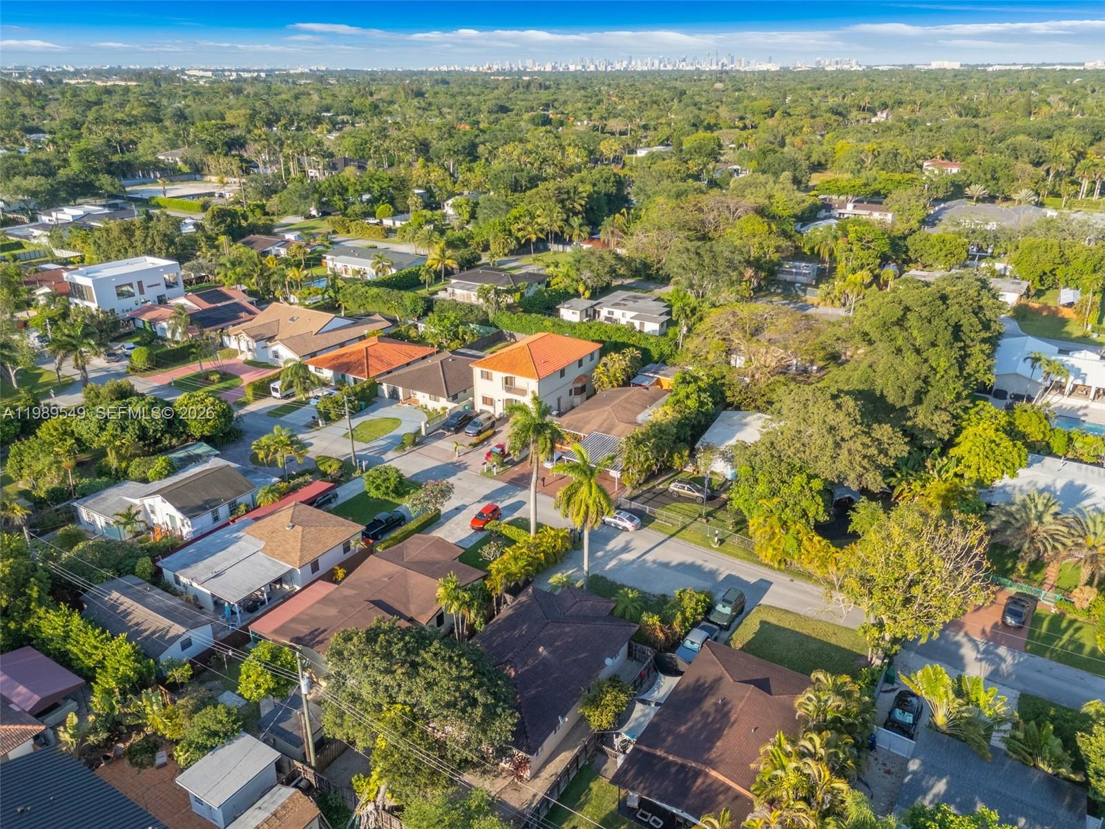 7048 Southwest 83rd Court Miami, FL 33143 - Photo 32 of 38 an aerial view of residential houses with outdoor space