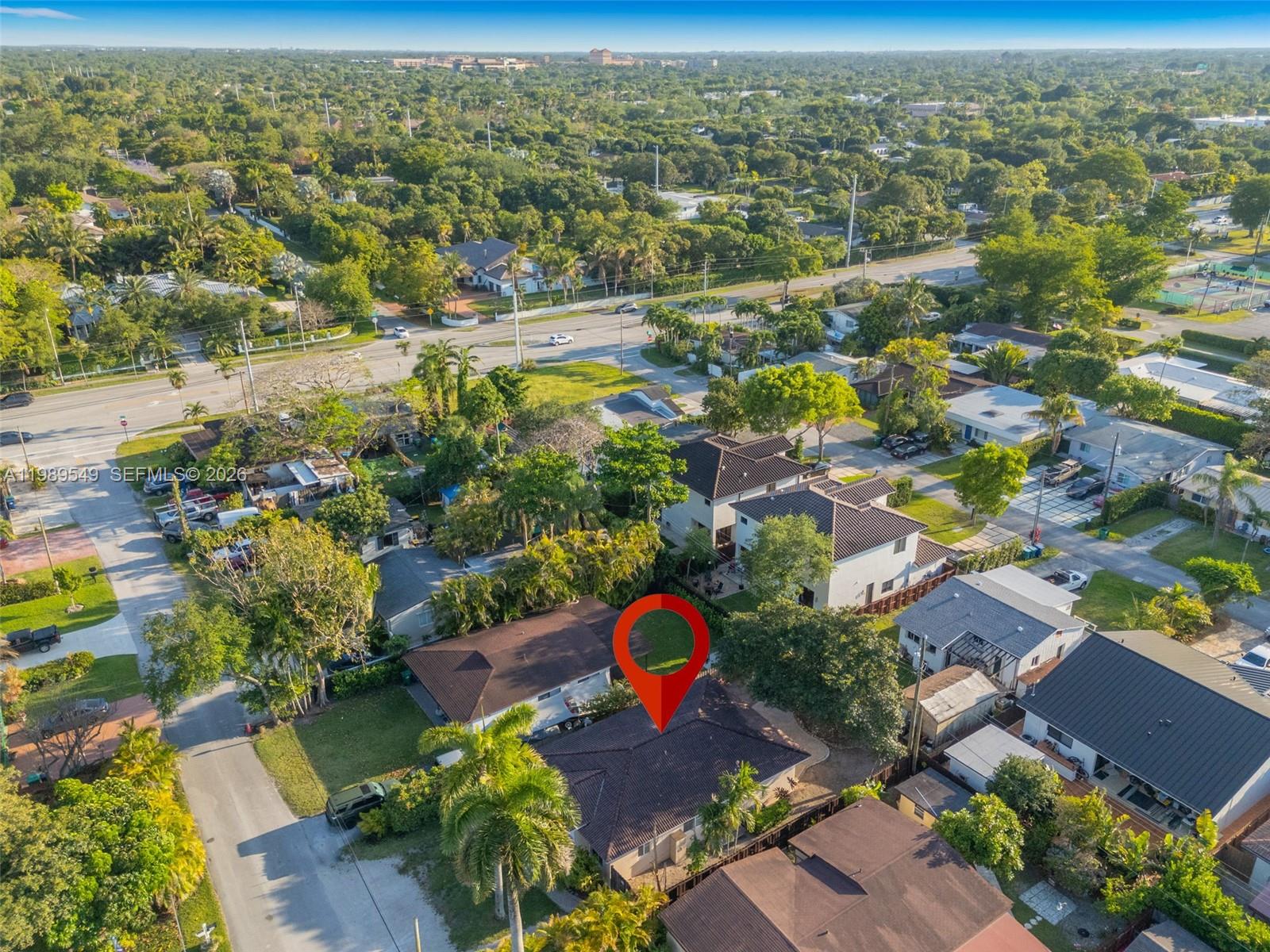 7048 Southwest 83rd Court Miami, FL 33143 - Photo 37 of 38 an aerial view of residential houses with outdoor space