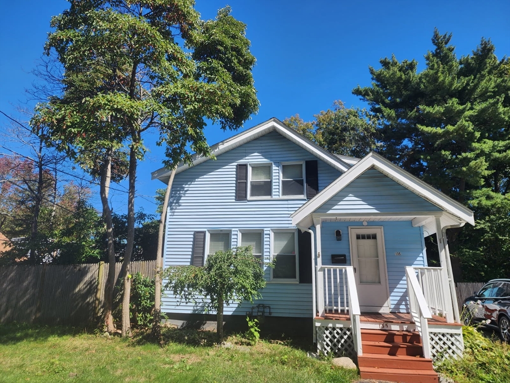 135 Guild Road Brockton, MA 02302 - Photo 9 of 12 a front view of a house with a yard