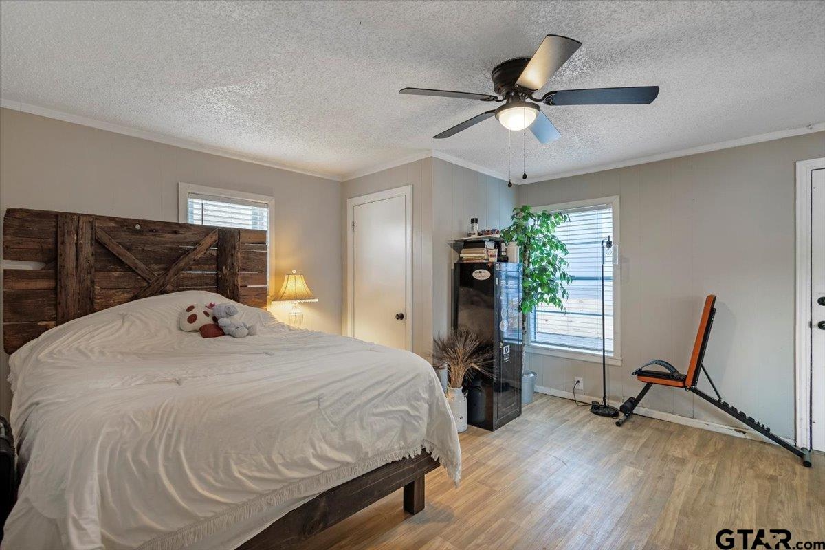 10286 US Highway 69 North Tyler, TX 75706 - Photo 27 of 31 a bedroom with a bed and a window