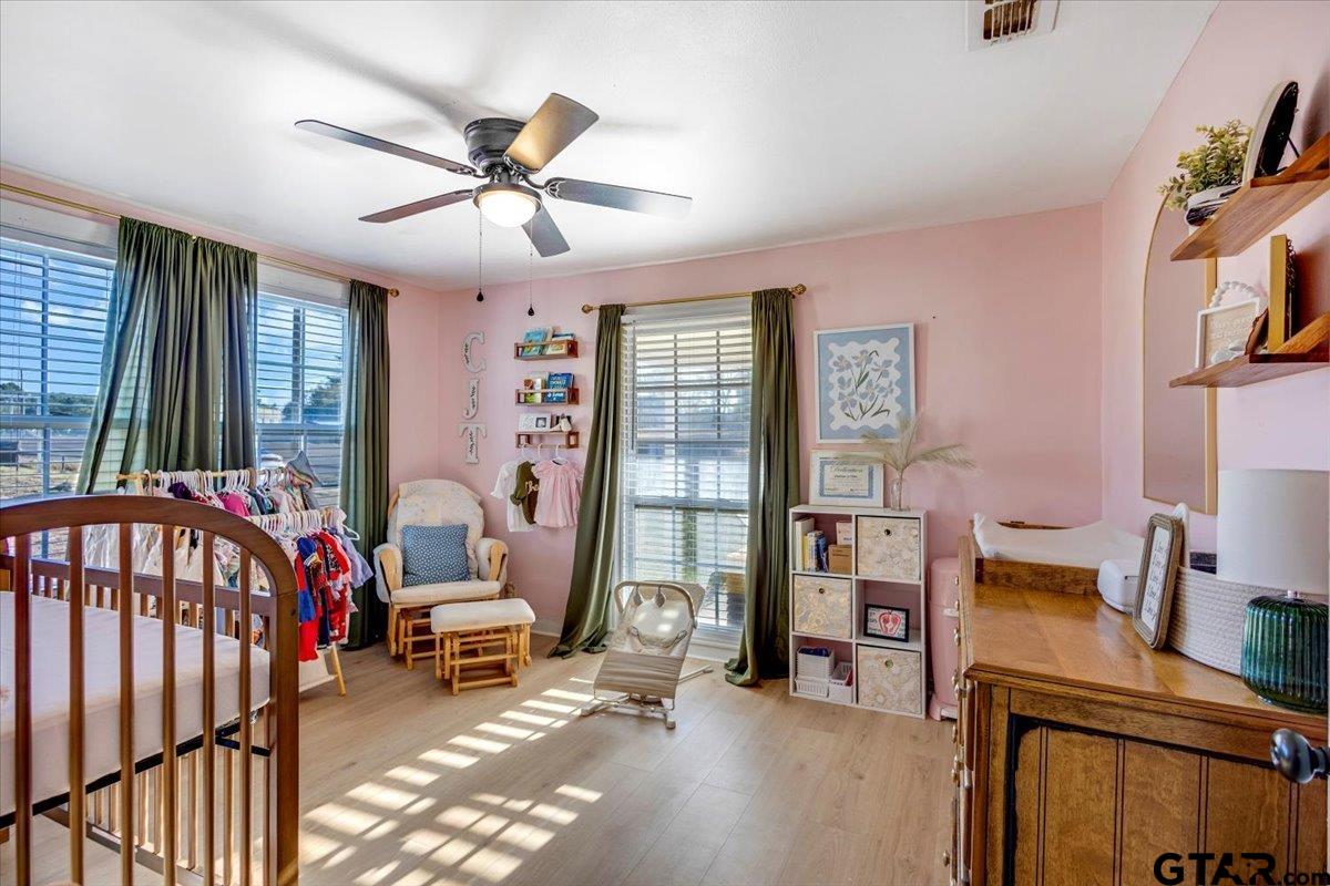 10286 US Highway 69 North Tyler, TX 75706 - Photo 28 of 31 a bed room with a bed and a window