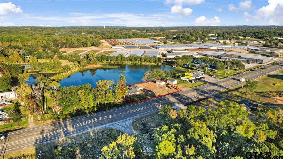 10286 US Highway 69 North Tyler, TX 75706 - Photo 9 of 31 an aerial view of residential houses with outdoor space and swimming pool