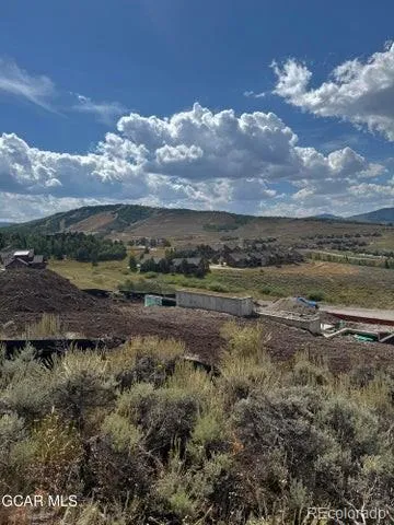 a view of a yard with an outdoor space