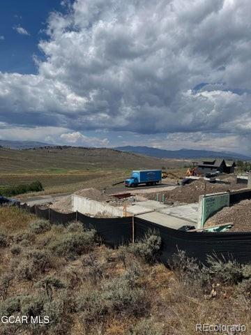 1166 Lower Ranch View Drive Granby, CO 80446 - Photo 9 of 41 a view of a dry yard with wooden floor and city view