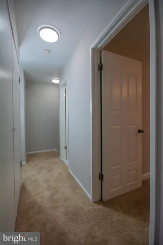 an empty room with fan