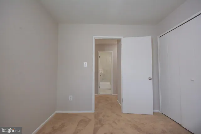 a view of a room that has a window