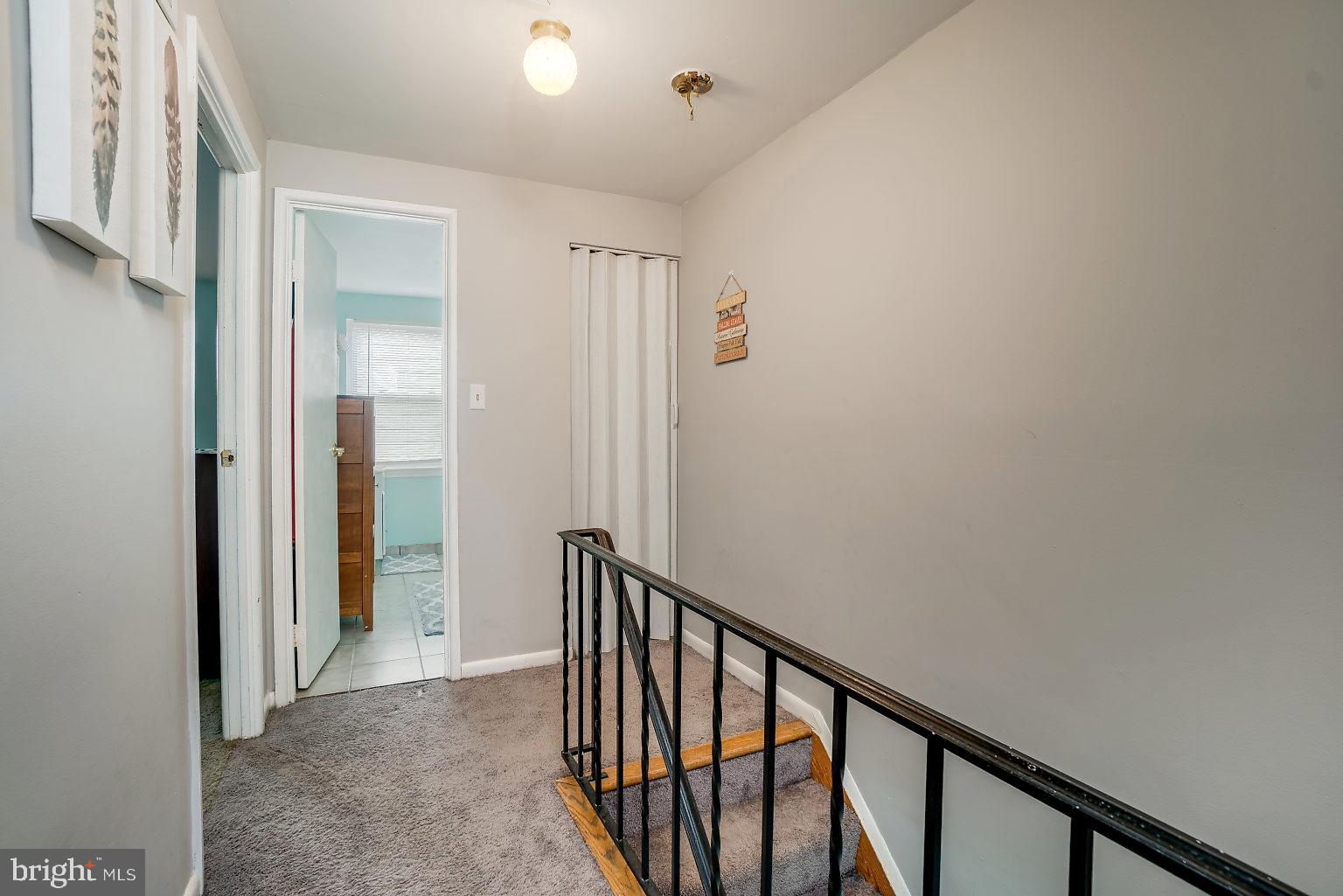3902 Misty View Road Baltimore, MD 21220 - Photo 15 of 27 Upstairs Hallway w/ Attic Pulldown