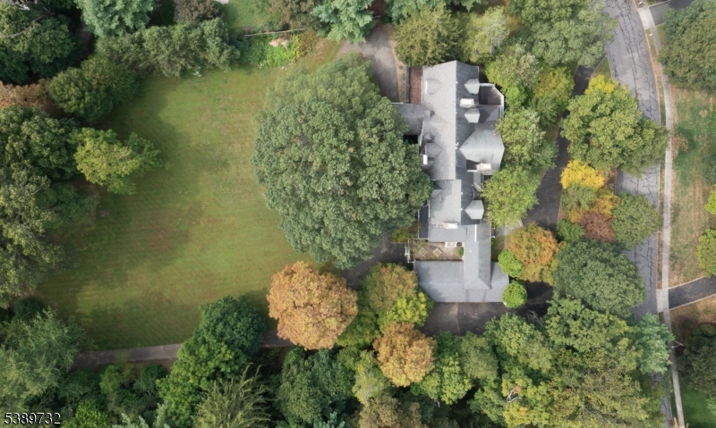 17 Three Gables Road Morristown, NJ 07960 - Photo 1 of 43 an aerial view of a house with a yard and lake view