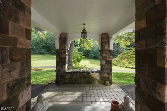 a view of porch with a yard
