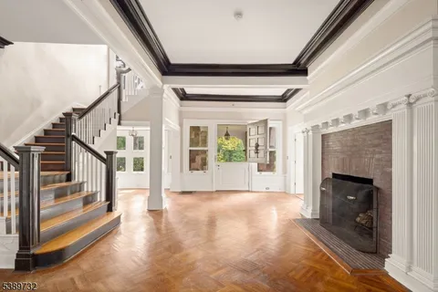 a view of an entryway with staircase