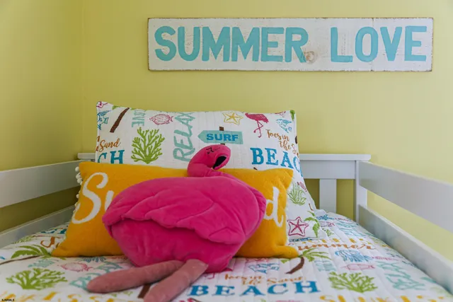 a bedroom with a bed and a bed