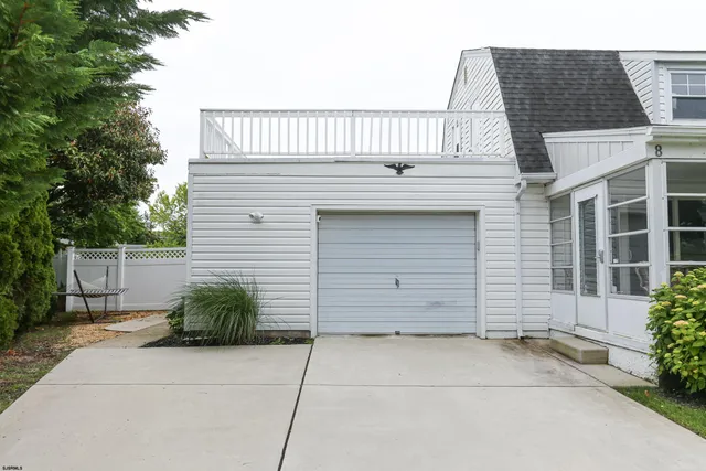 a view of a house with a garage