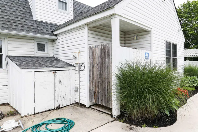 a view of a swimming pool with a yard