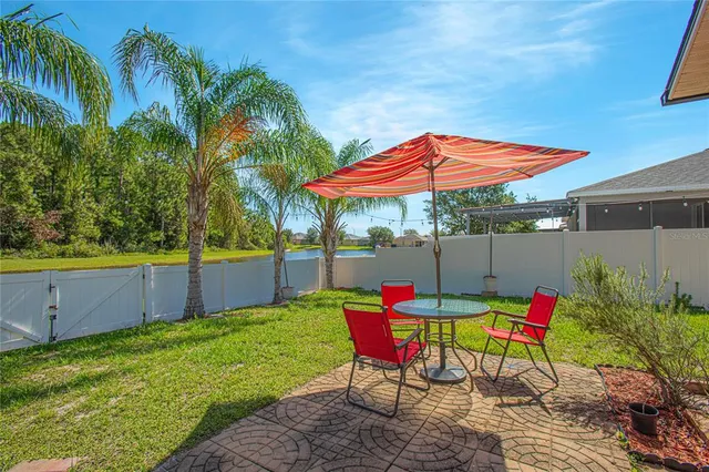 a bathroom with a sink a mirror and vanity