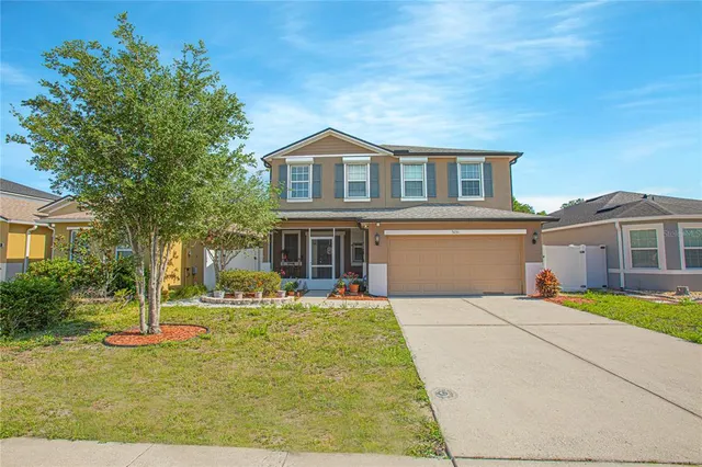 a front view of house with yard