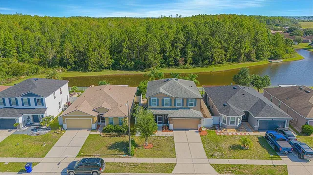 an aerial view of a house with a garden