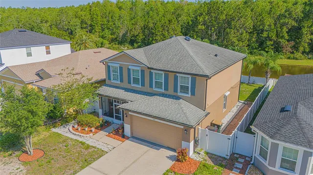 an aerial view of a house with garden