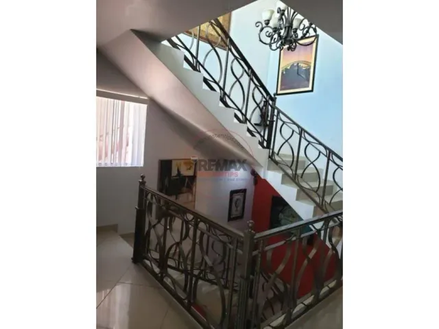 a view of a livingroom with furniture and a window