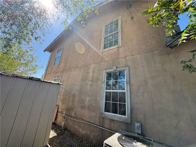 a house with trees in front of it