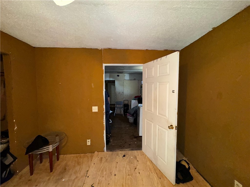 122 West 5th Street Alice, TX 78332 - Photo 26 of 40 a bedroom with a bed and furniture