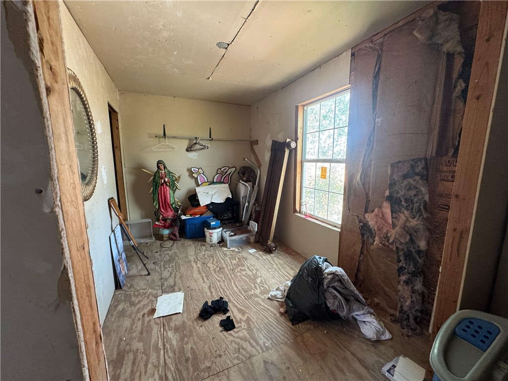 122 West 5th Street Alice, TX 78332 - Photo 30 of 40 a room with furniture and a window