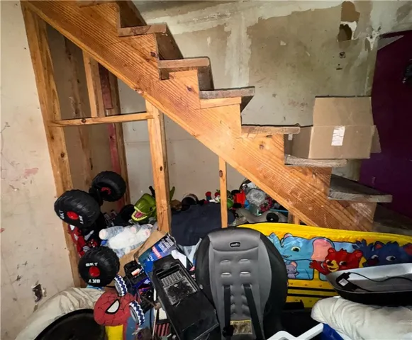 a room with furniture and a window