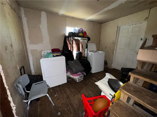 a view of a hallway with a room