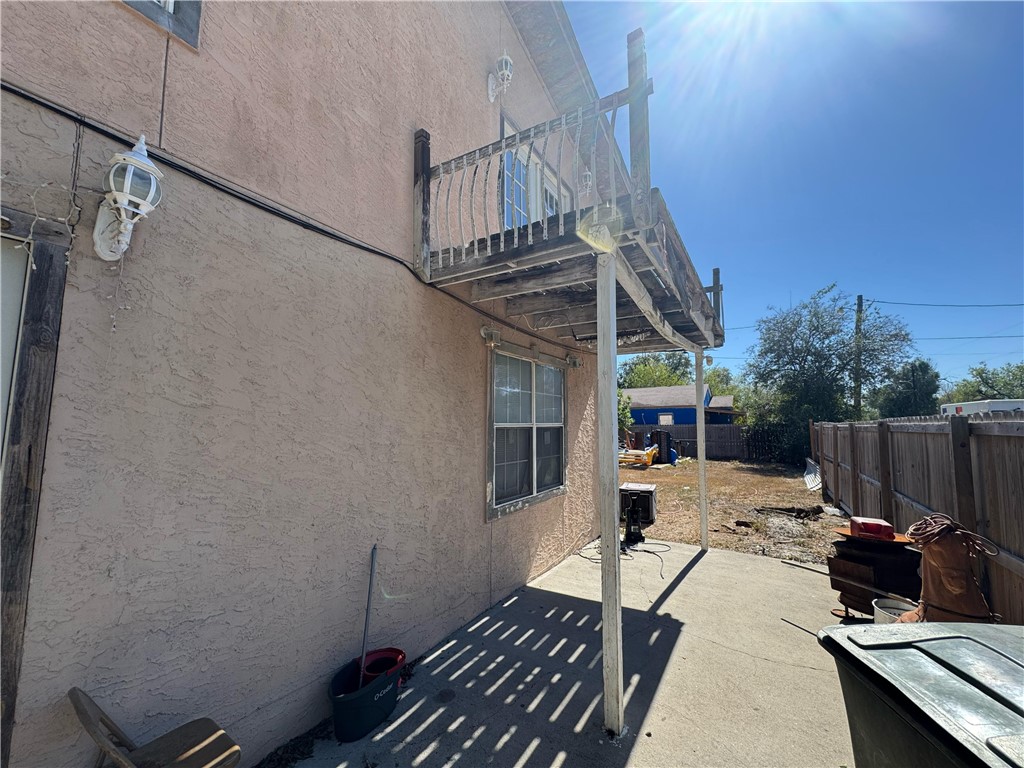 122 West 5th Street Alice, TX 78332 - Photo 7 of 40 a view of a patio with a dining table and chairs