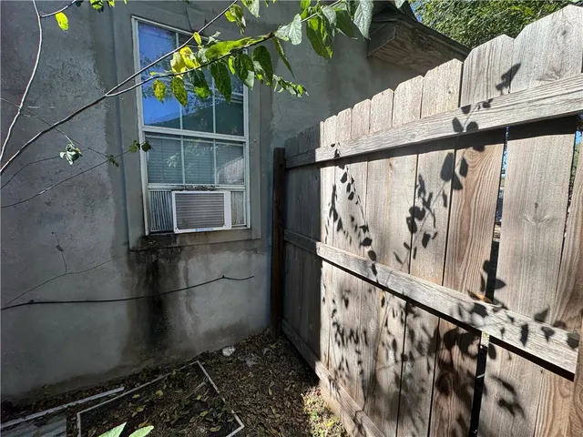 a view of staircase with wooden walls and stairs