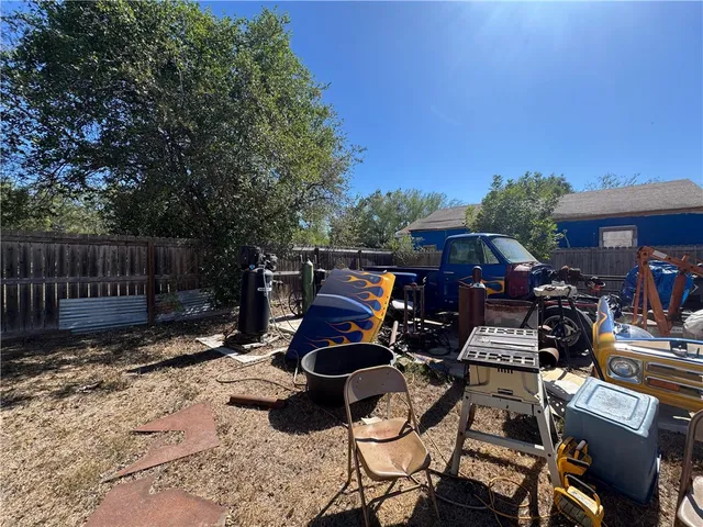 a view of a chairs and tables in the patio