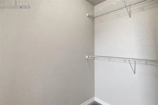 a bathroom with a sink vanity and a mirror