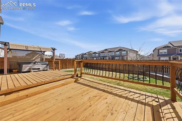 a view of backyard with deck