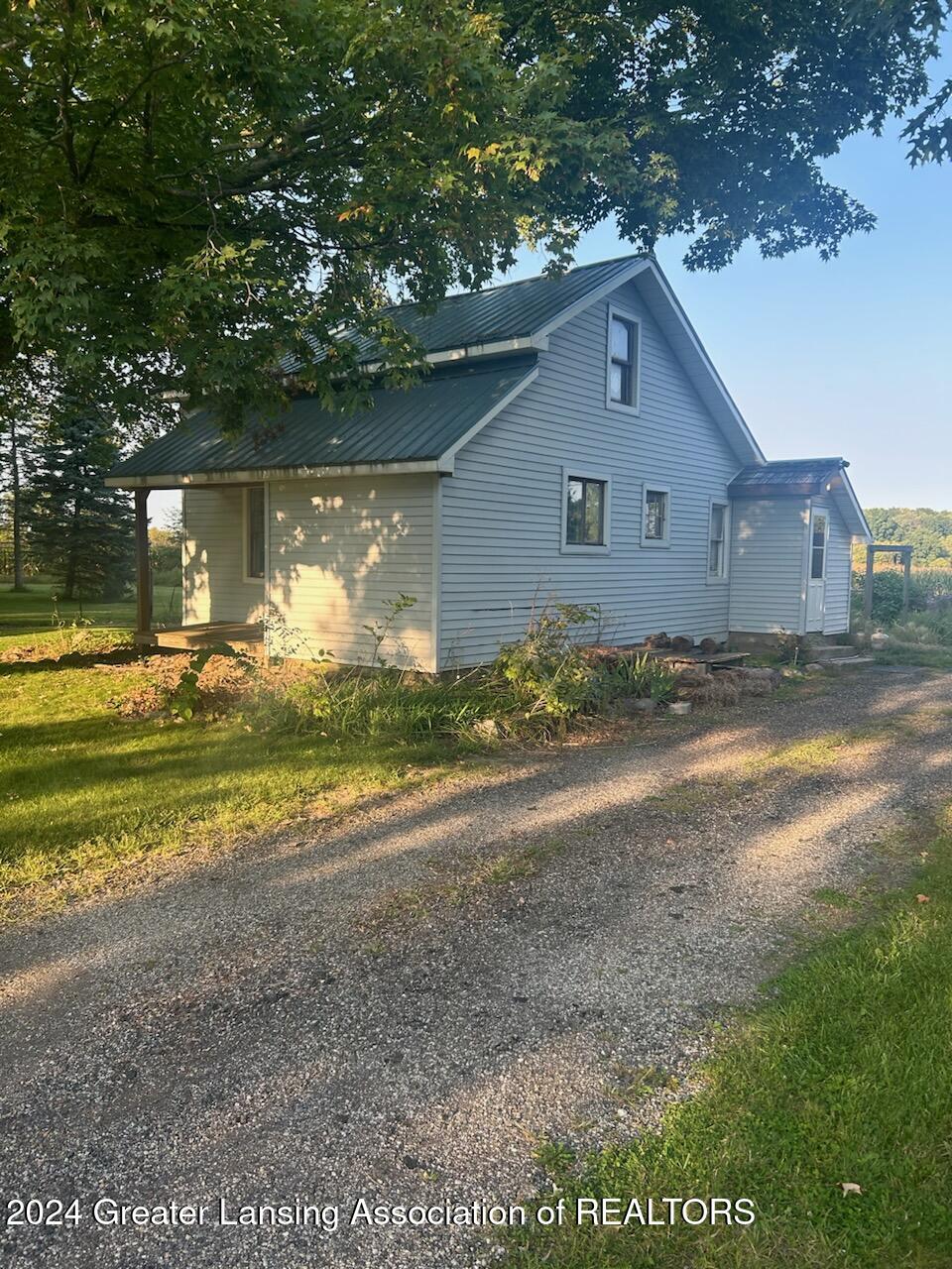 84 Kingman Road Mason, MI 48854 - Photo 1 of 23 074C75