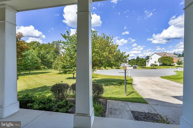 a view of swimming pool from a yard
