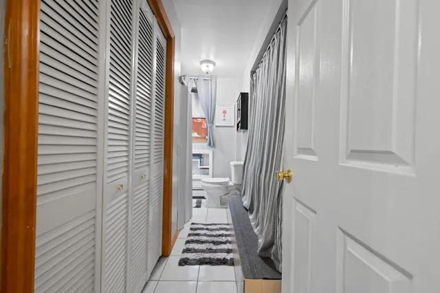 a view of an outdoor sitting area with furniture