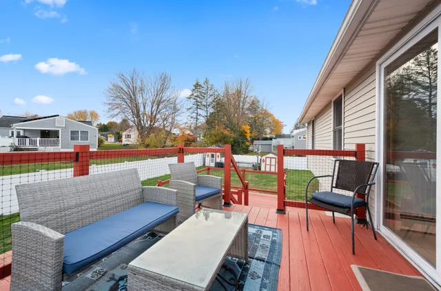 a view of a balcony with chairs