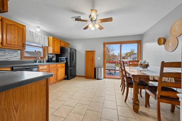 a view of a kitchen and dining room