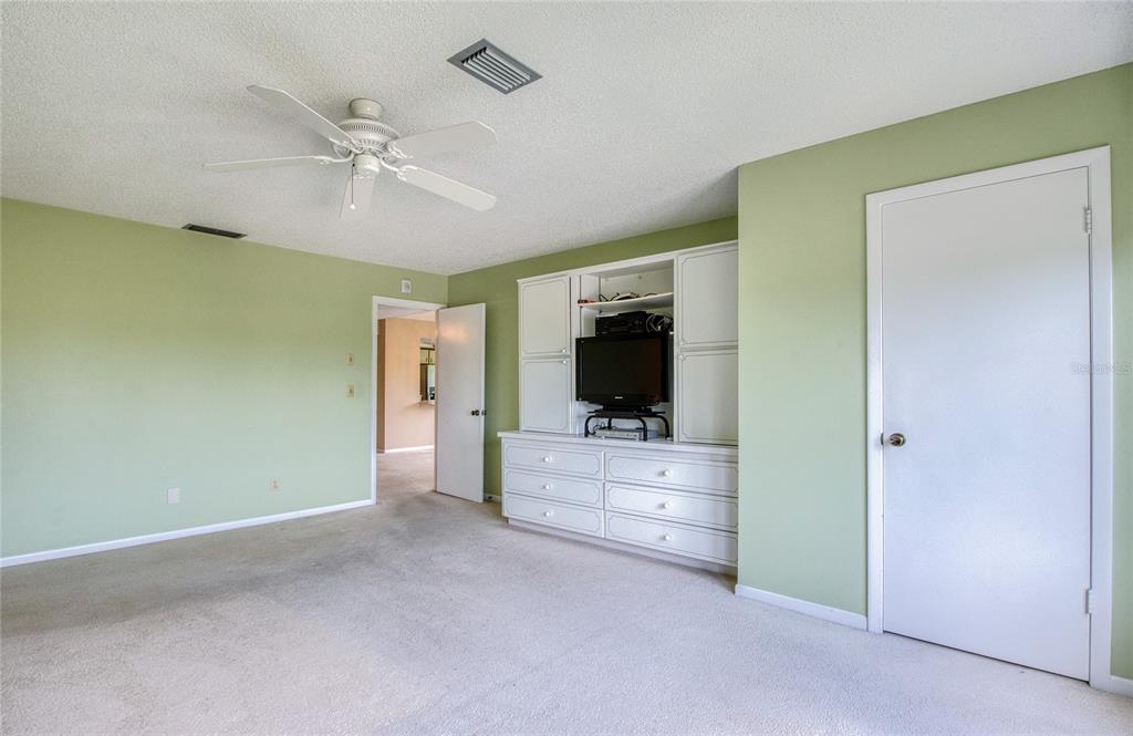 700 Starkey Road, Unit 1145 Largo, FL 33771 - Photo 23 of 63 a view of a livingroom with furniture and a flat screen tv