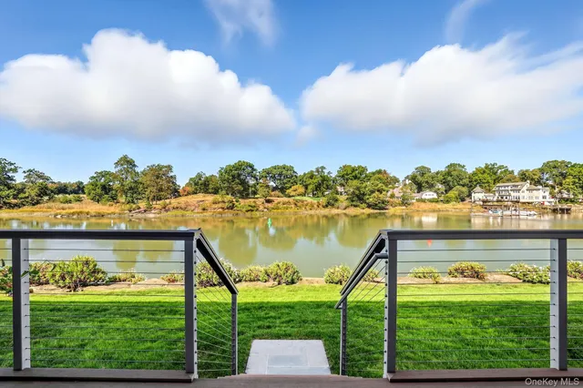 a view of a lake with a big yard