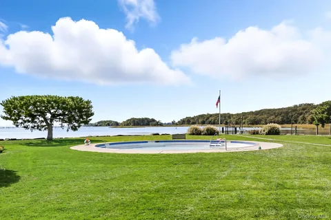 a view of outdoor space green field and trees