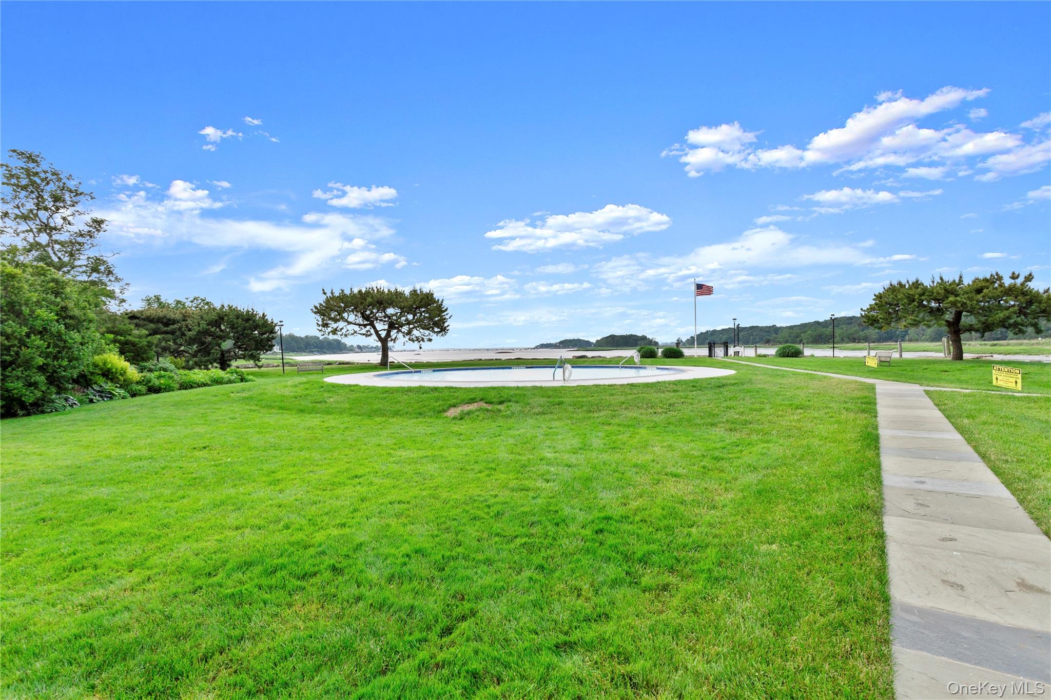 720 Milton Road, Unit H3 Rye, NY 10580 - Photo 23 of 27 a view of outdoor space green field and trees