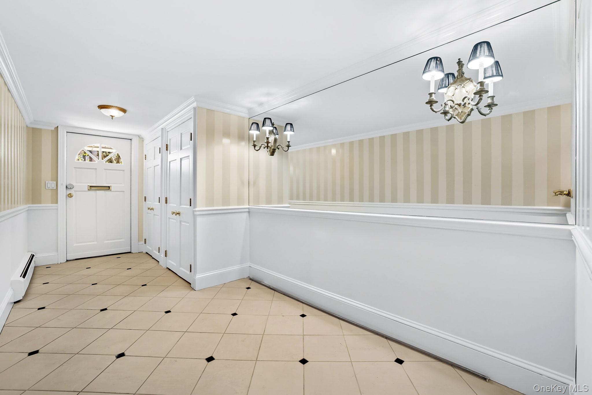 720 Milton Road, Unit H3 Rye, NY 10580 - Photo 4 of 27 a view of a chandelier fan