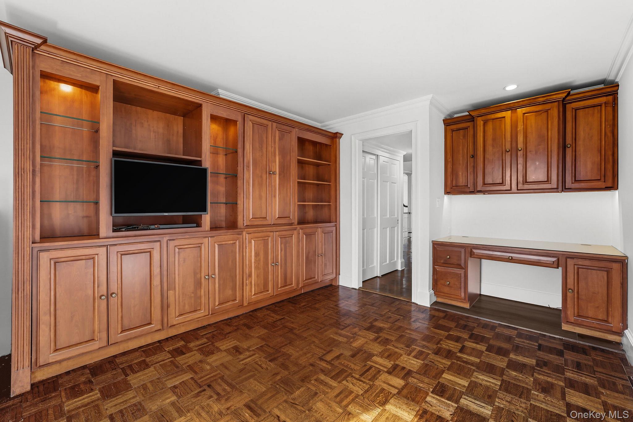 720 Milton Road, Unit H3 Rye, NY 10580 - Photo 9 of 27 a living room with fireplace furniture and a flat screen tv