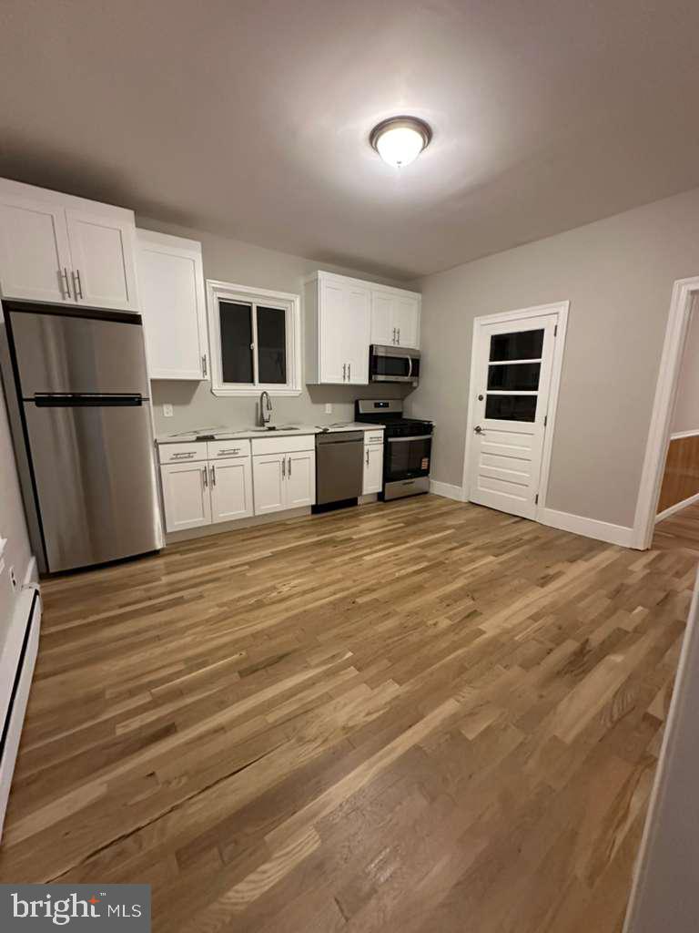 220 Berlin Road Clementon, NJ 08021 - Photo 6 of 15 a view of kitchen and microwave