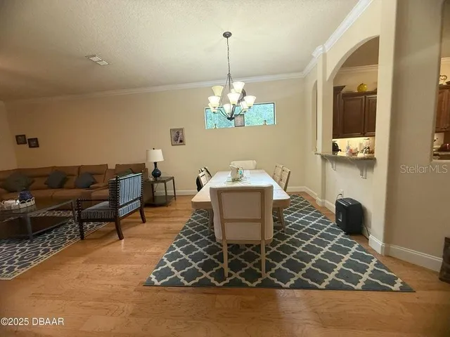 a living room with a couch and a table