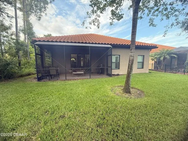 a house view with a garden space