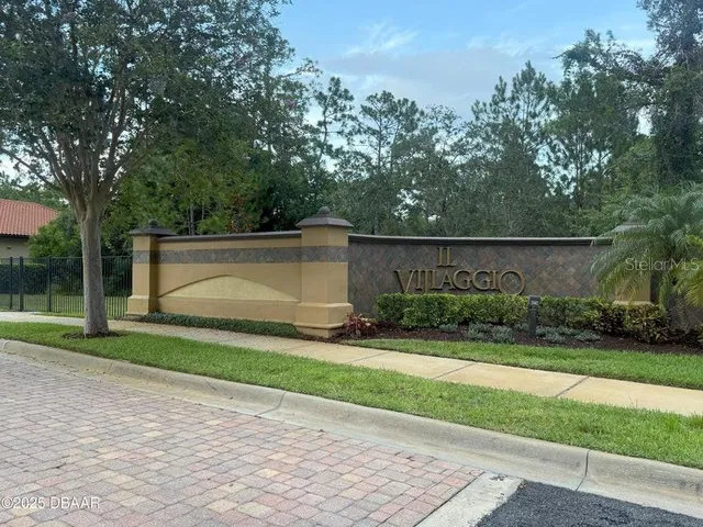 a view of backyard with green space
